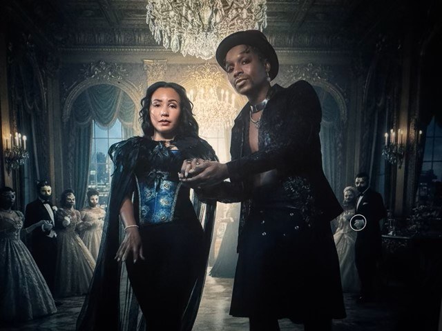 Sandrine and Elijah with chandelier(1)